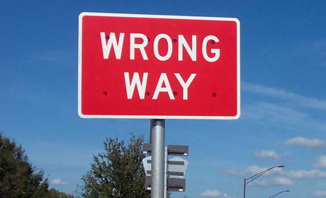 Wrong way road sign